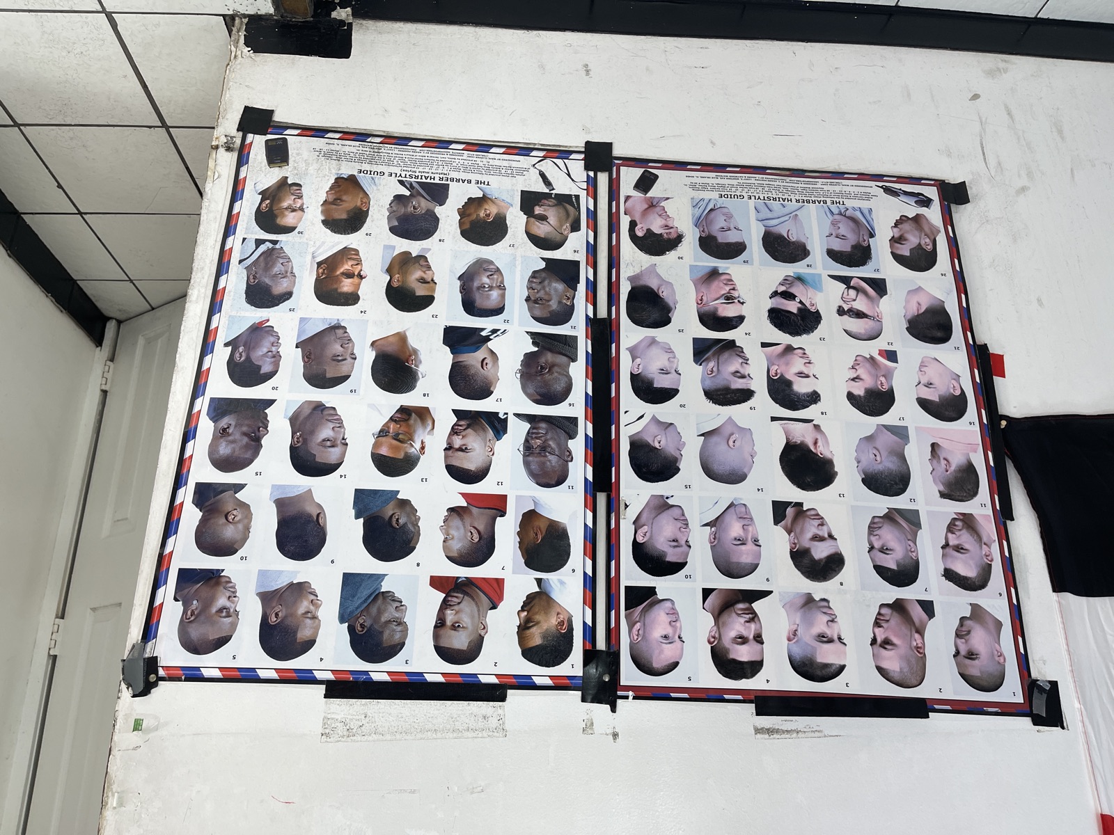 A wall of haircut style photos to choose from